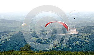 Paragliders flying in Romania