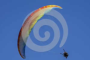 Paragliders looking for thermals amongst the snow caps of the Monte Blanc Massif, Chamonix,