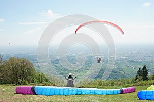 Paragliders taking off