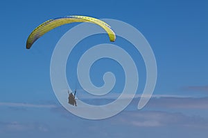 Paragliding above the clouds photo