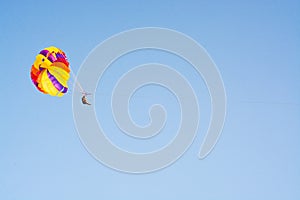 Paragliding along beautiful coastline