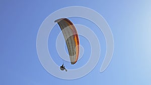 Paragliding on the background of blue sky. Live a healthy life. Be H3althy