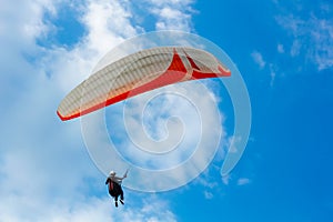 Paragliding in the blue sky