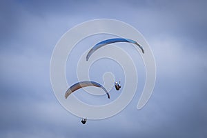 Paragliding in blue sky over Puerto de la Cruz on Tenerife