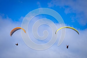 Paragliding in blue sky over Puerto de la Cruz on Tenerife