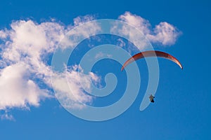 Paragliding in Bright Blue Skies
