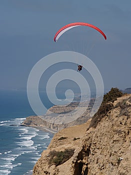 Paragliding close to cliff