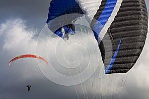 paragliding in the clouds photo