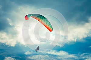 Paragliding extreme Sport with blue Sky and clouds