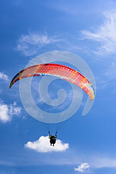 Paragliding extreme Sport with blue Sky and clouds