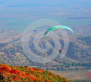 Paragliding flight over the mountains. Makedonia