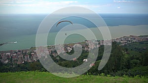 Paragliding Flying Over the City