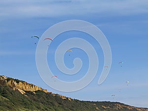 Paragliding in the Fonte da Telha beach photo
