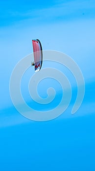 Paragliding off Giulianova beach, Italy, on sunny, April day, over Adriatic sea photo