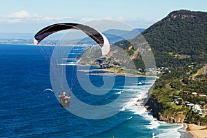 Paragliding over the acean and coastal escarpment photo
