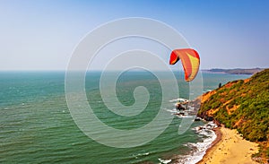 Paragliding over Arambol beach. North Goa, India