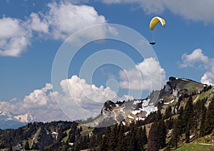 Paragliding over mountains