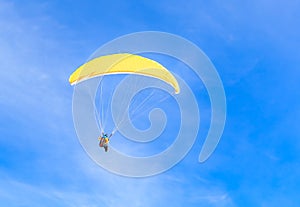 Paragliding over the mountains in winter. Ski resort Hopfgarten