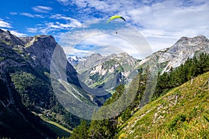 Paragliding over the pralognan mountains in the Vanoise National Park photo