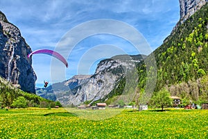 Paragliding parachuting is an extreme sport and recreation. Paragliding at the landing