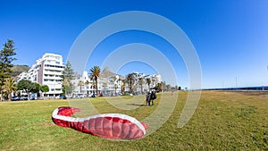 Paragliding Red ParachuteTandem Landing Cape Town