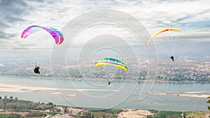 Paragliding in the sky. Paraglider  flying over Landscape from Beautiful View Mekong River