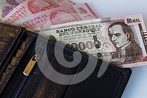Paraguay banknotes, Guaranies sticking out of the wallet photo