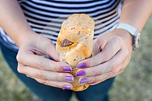 Paraguayan chipa cheese bread with chorizo sausage at a street food market. photo