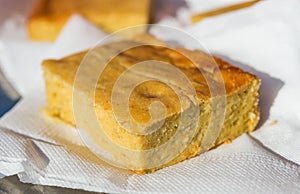 Paraguayan dish called sopa paraguaya at a street food market. photo