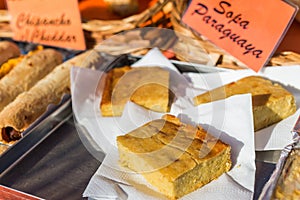 Paraguayan dish called sopa paraguaya at a street food market. photo