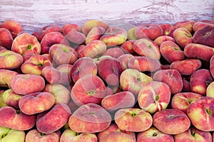 Paraguayan sweet peaches stacked in a container box to the raw for sale