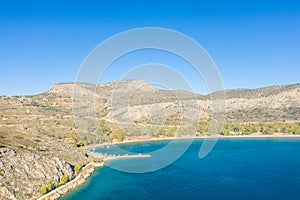 Paralia karathona beach port on arid coast , Europe, Greece, Peloponnese, Argolis, Nafplion, Myrto seashore in summer on a sunny