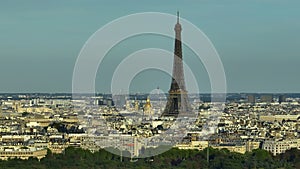 Parallax effect. Close-up shot of the Eiffel tower on a drone from a height. Aerial Panorama of Paris Cityscape