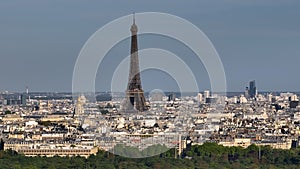 Parallax effect. Close-up shot of the Eiffel tower on a drone from a height. Aerial Panorama of Paris Cityscape