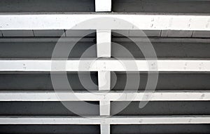 Parallel concrete support beams under a bridge