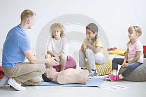 Paramedic and children during training