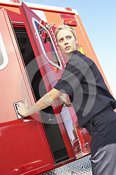 Paramedic closing ambulance doors