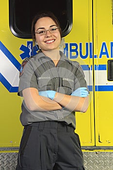 Paramedic, closing the door of the ambulance