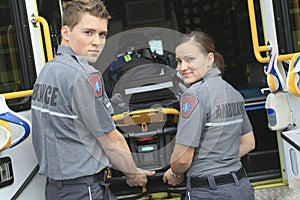 Paramedic employee with ambulance