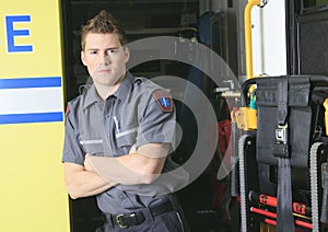 Paramedic employee with ambulance