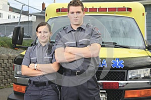 Paramedic employee with ambulance in the