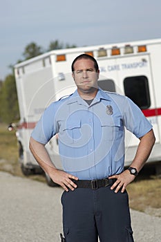 Paramedic In Front Of Ambulance