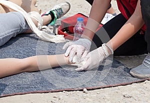 Paramedic helping an injured person after accident