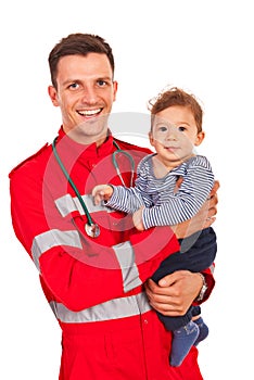 Paramedic holding baby boy