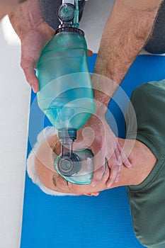 Paramedic performing resuscitation on patient