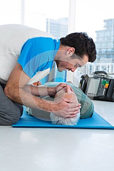 Paramedic performing resuscitation on patient