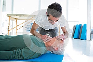 Paramedic performing resuscitation on patient