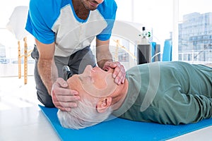 Paramedic performing resuscitation on patient