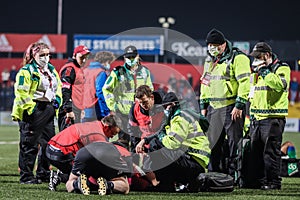 Paramedics assist an injured player at the United Rugby Championship match between Munster 51 and Benetton 22