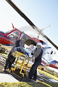 Paramedics Unloading Patient From Helicopter